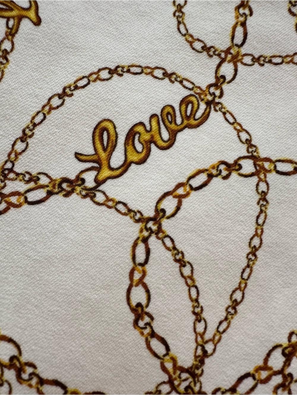 New York & Company White Top with Gold Chain Motif